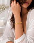Luxury gold screw bracelet for women with CZ stones made from stainless steel worn on female wrist